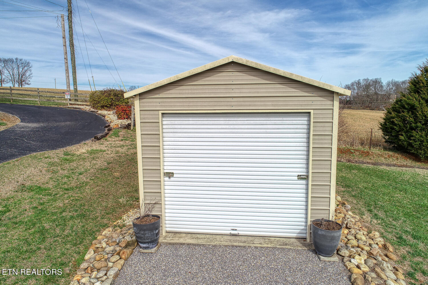 2449 Oakview Lane Sevierville, TN 37876 - Photo 38 of 41 Storage Shed w/Roll-Up Door