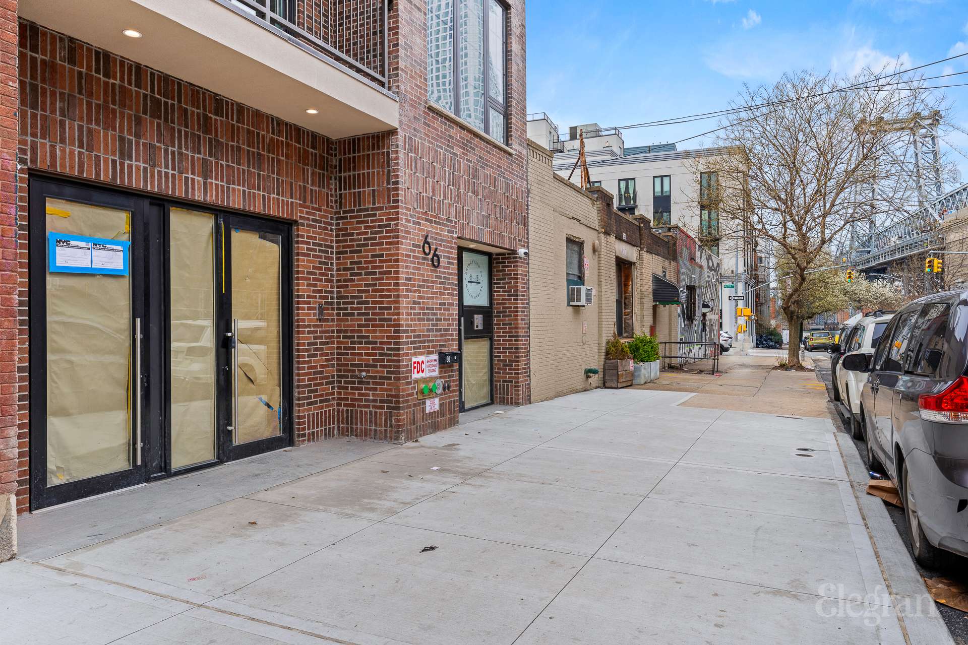 66 South 6th Street, Unit 1A Brooklyn, NY 11249 - Photo 1 of 13 a view of a building with a street