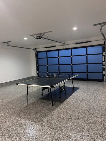 a big room with lots of table and chairs