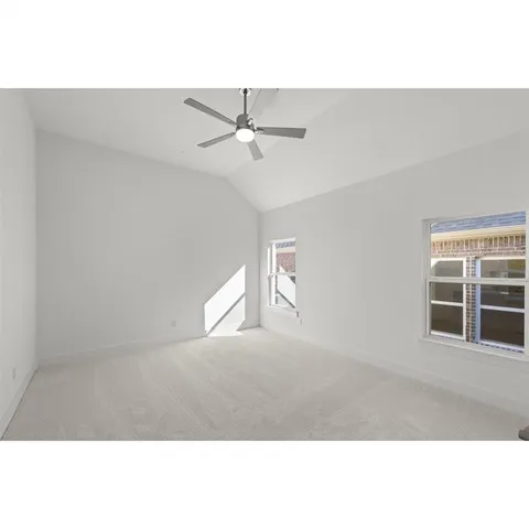 wooden floor in an empty room with a fireplace