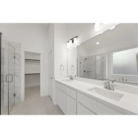 a view of a room with windows and chandelier