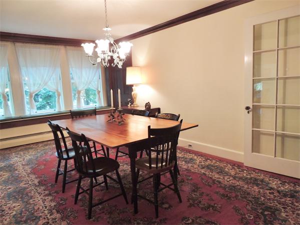 1 Walnut Road Wenham, MA 01984 - Photo 6 of 22 a dining room with furniture a chandelier and window