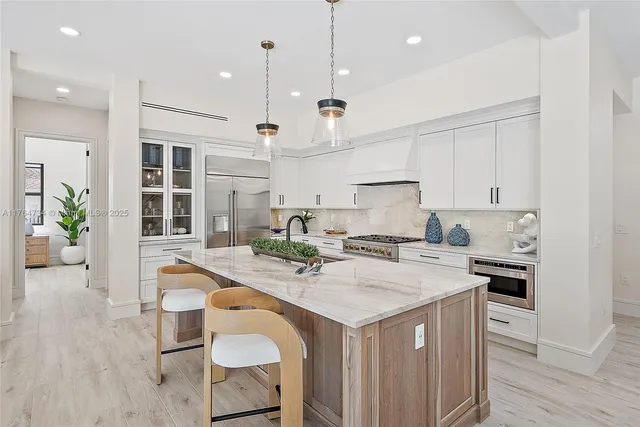 a bed room with a bed and a large window