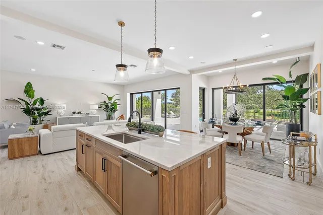 a bathroom with a sink vanity and a mirror