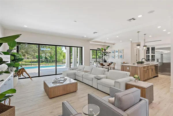 a living room with furniture and a window