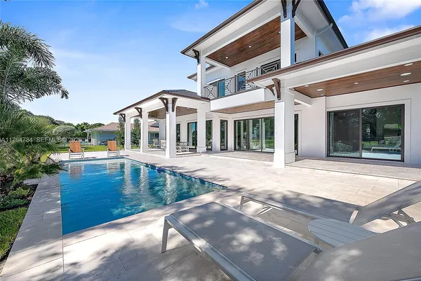 a view of backyard with green space