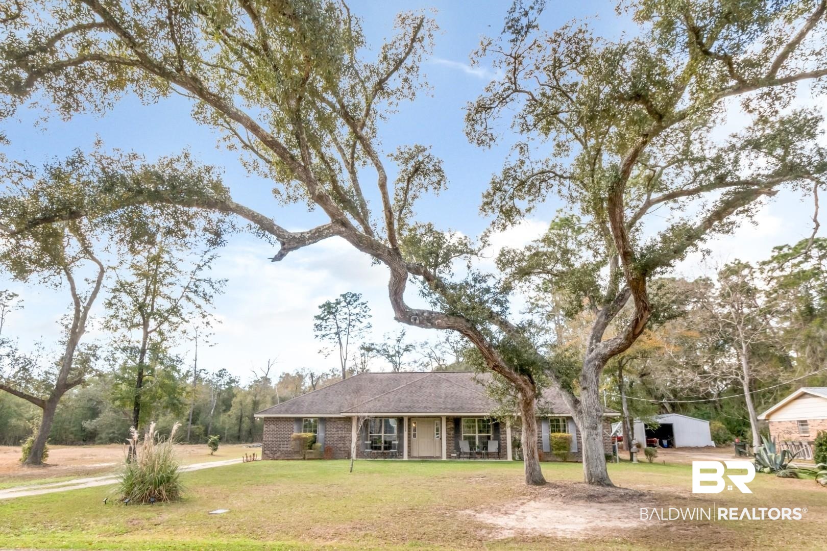 11528 Mocking Bird Lane Fairhope, AL 36532 - Photo 42 of 45 Ranch-style house featuring a front lawn and brick siding