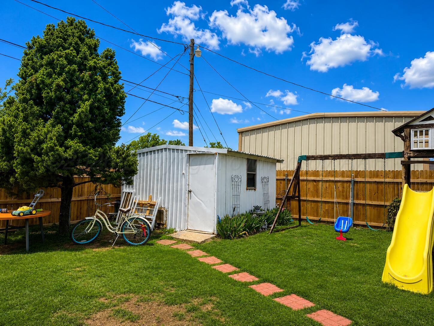 8202 Tejas Trail Amarillo, TX 79110 - Photo 26 of 26 Backyard and shed