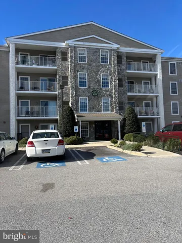 a front view of a house with yard