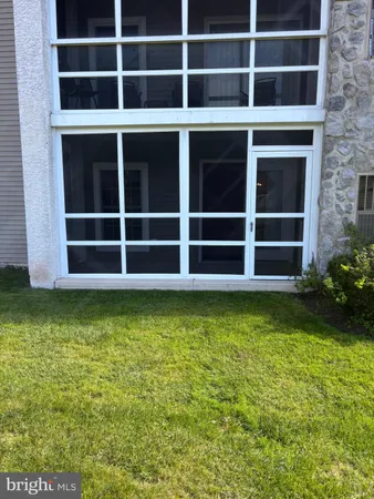 a view of a house with a large window