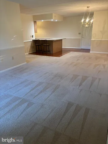 a view of a kitchen with a sink and a dishwasher