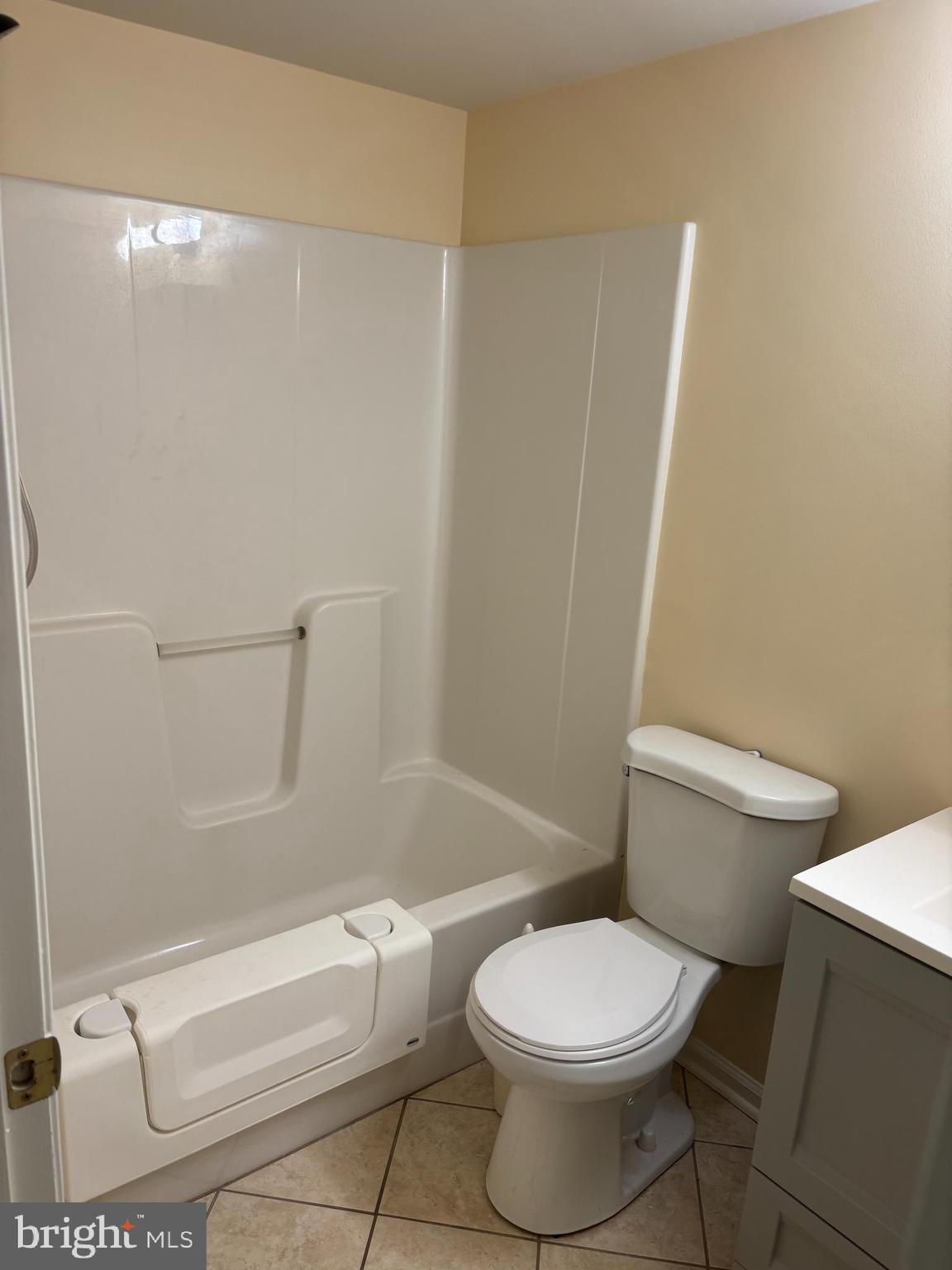620 Brandon Road Norristown, PA 19403 - Photo 9 of 19 a white toilet sitting next to a bath tub