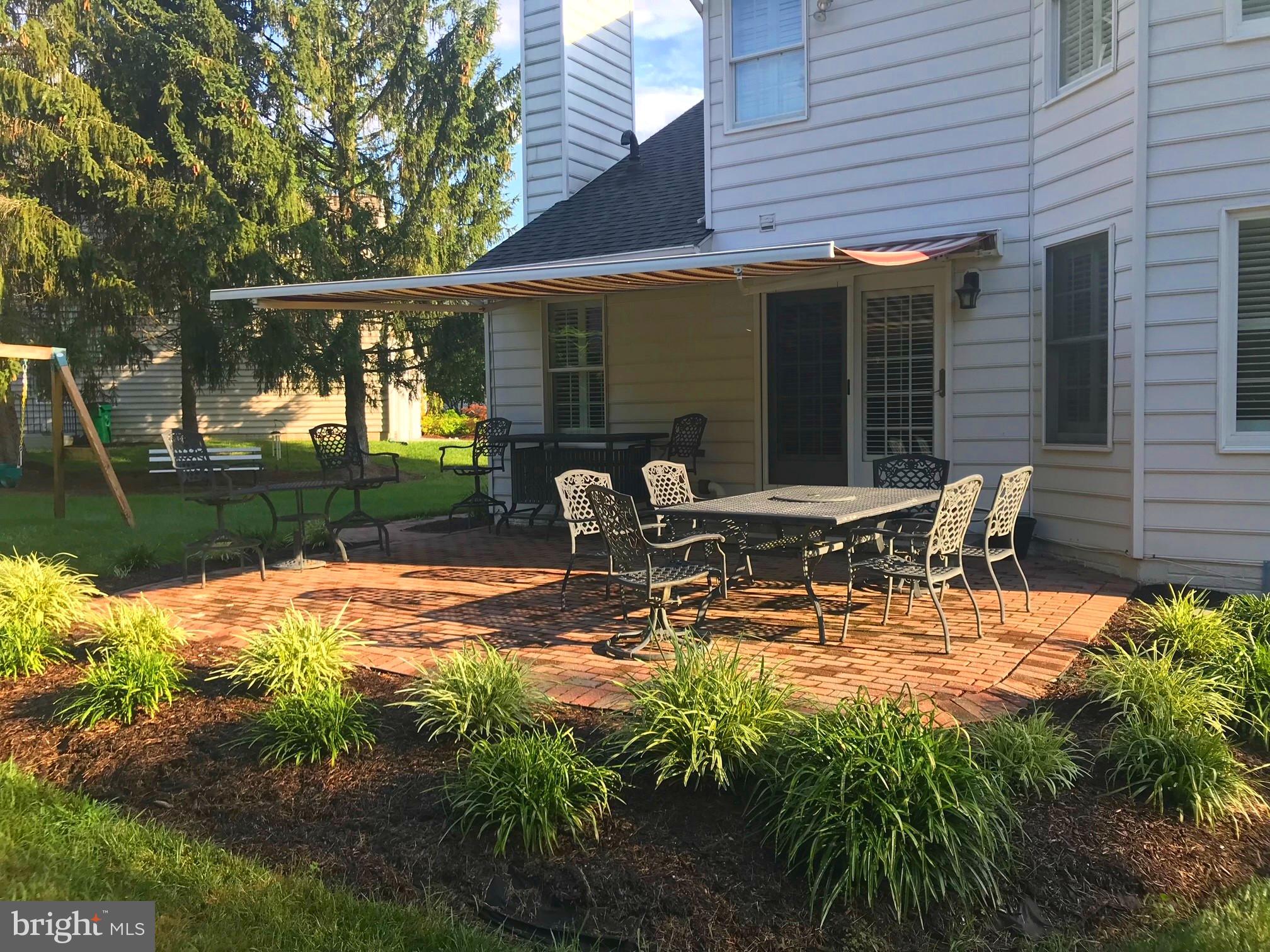 6509 Apple Blossom Ride Columbia, MD 21044 - Photo 24 of 78 RETRACTABLE AWNING PROVIDING SHADE ON HOT DAYS