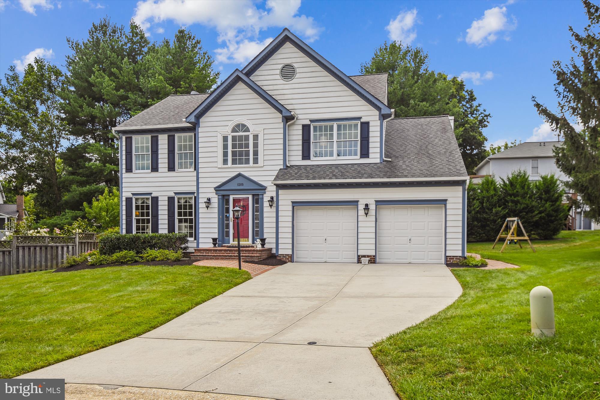 6509 Apple Blossom Ride Columbia, MD 21044 - Photo 64 of 78 2 CAR ATTACHED GARAGE & CONCRETE DRIVEWAY