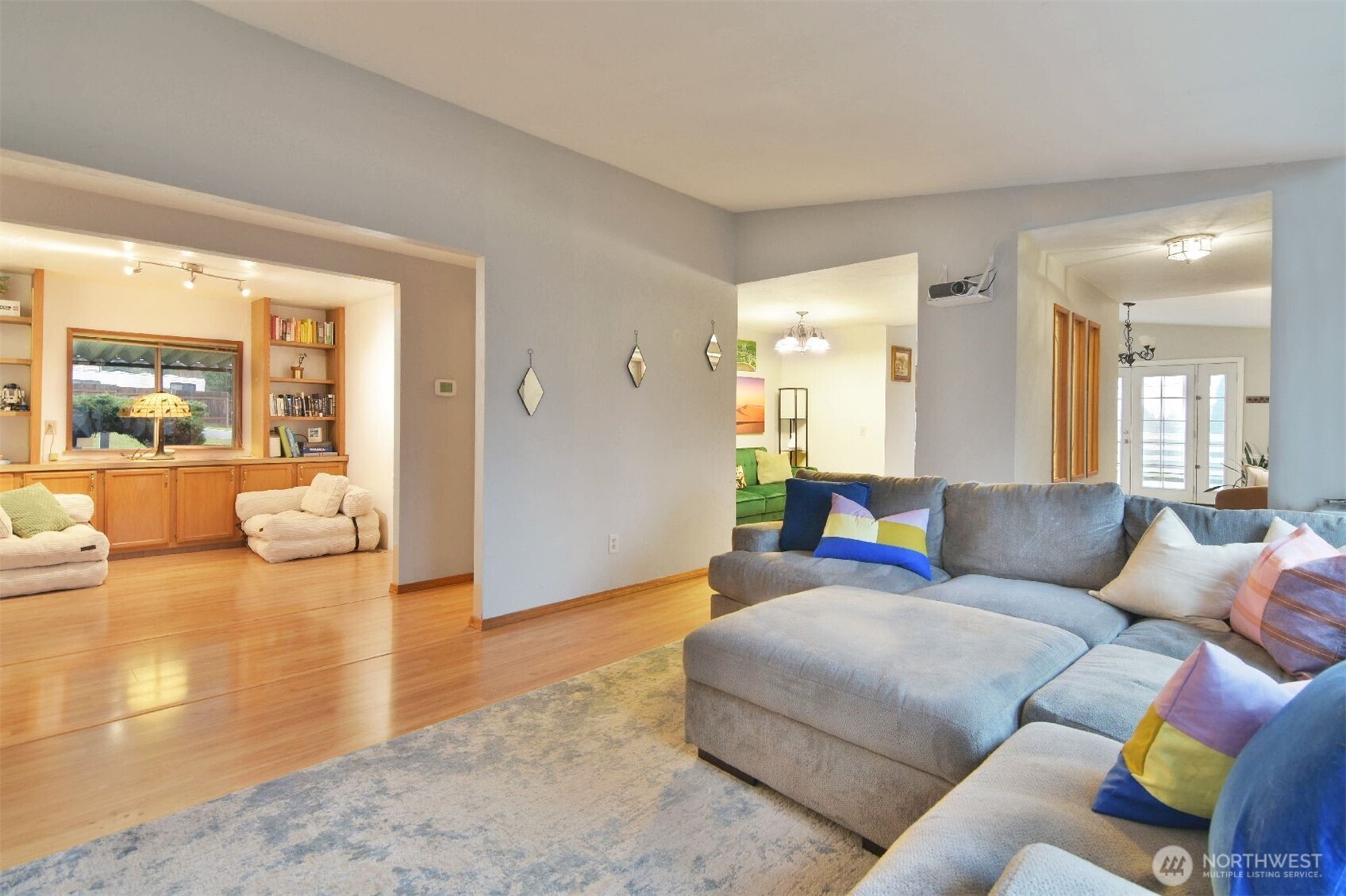 12611 Northeast 197th Street Bothell, WA 98011 - Photo 15 of 30 a living room with furniture and a large window