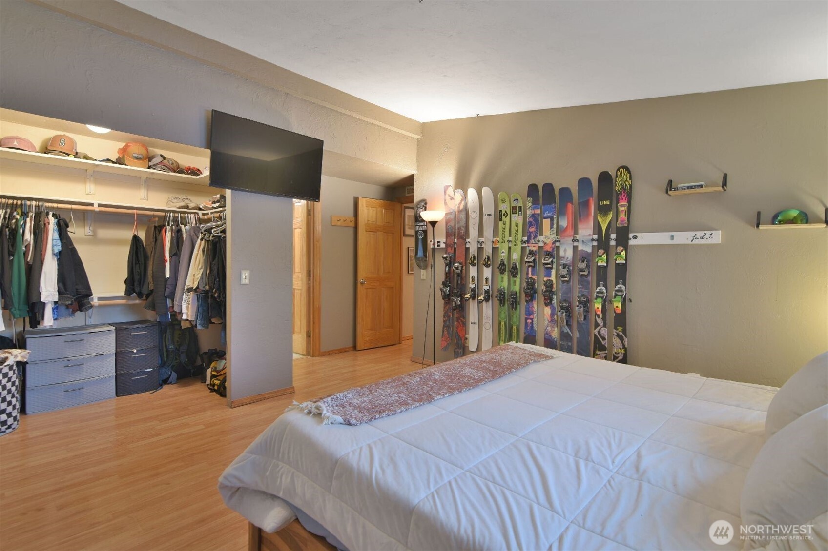 12611 Northeast 197th Street Bothell, WA 98011 - Photo 20 of 30 a bedroom with a bed and a large mirror on the dresser