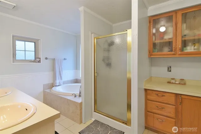 a work room with furniture and a window