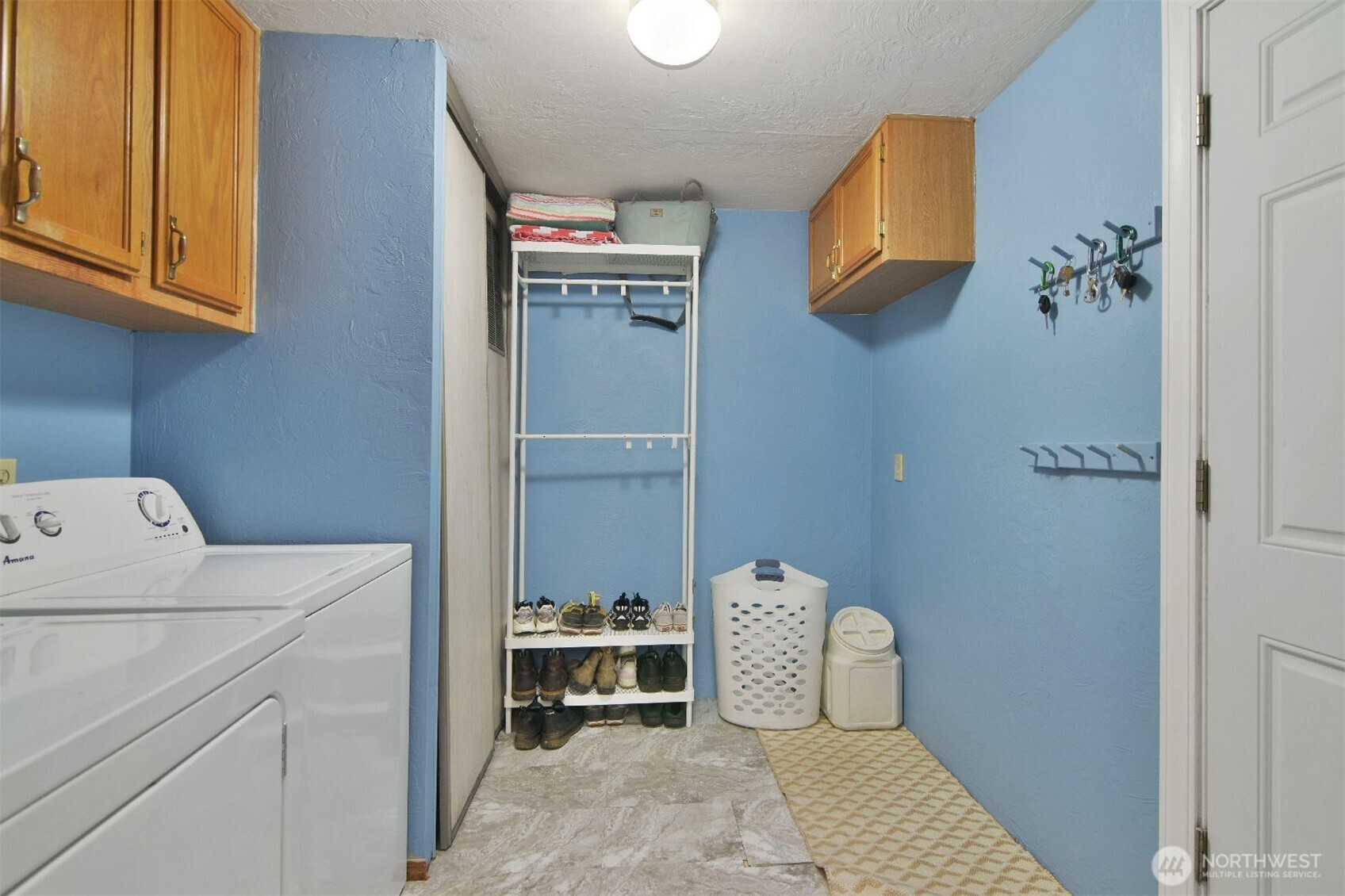 12611 Northeast 197th Street Bothell, WA 98011 - Photo 27 of 30 a utility room with dryer and washer