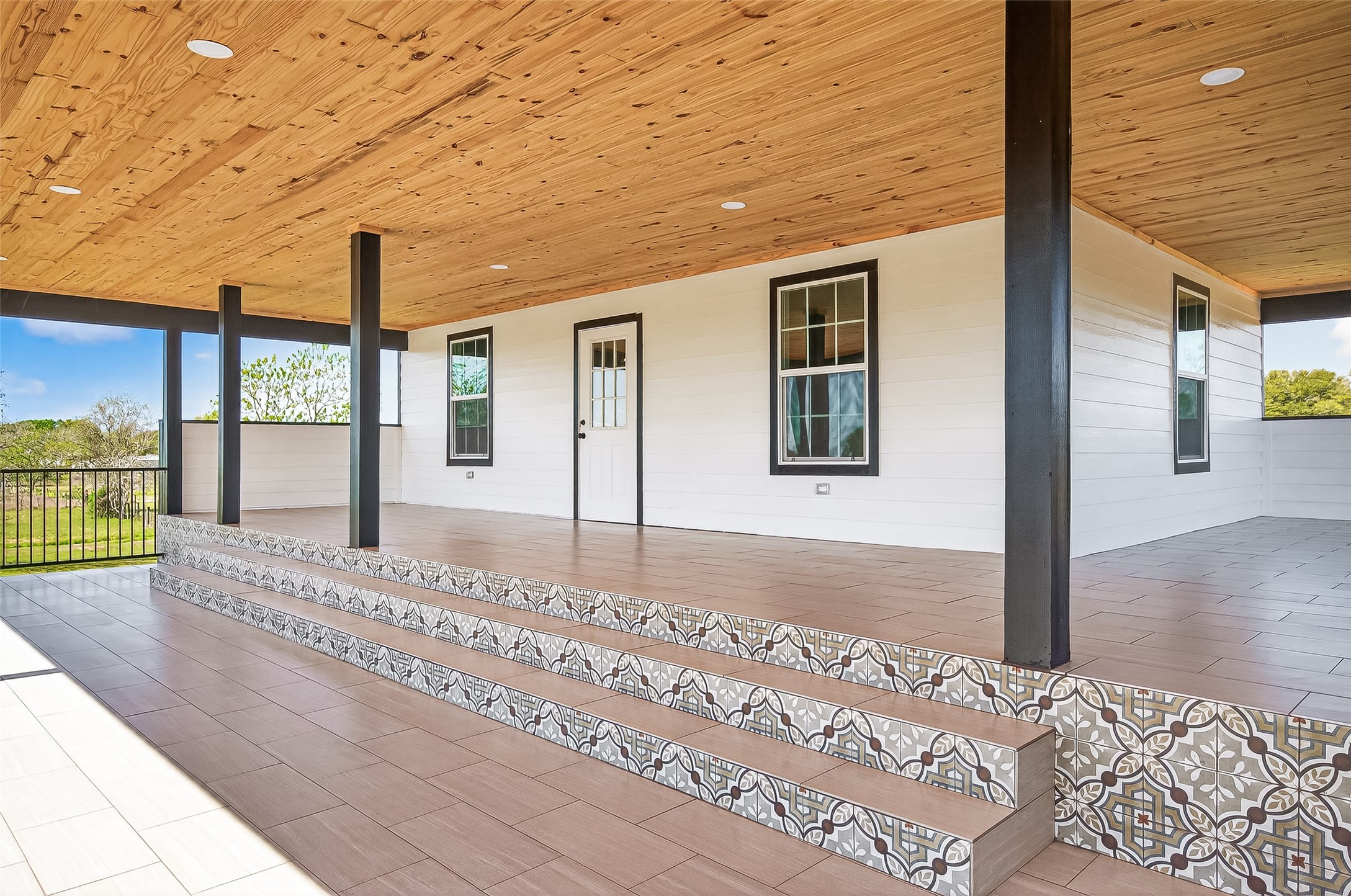 12212 Padon Road Needville, TX 77461 - Photo 20 of 37 Covered 2nd story balcony with 180 degree views