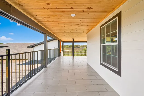 a view of a kitchen and a window