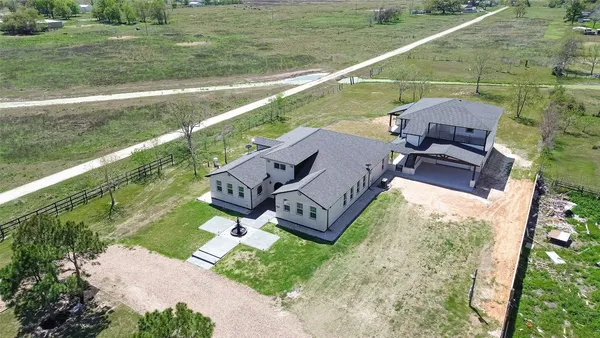 a view of a lake with a yard