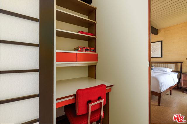 a view of a balcony with wooden floor