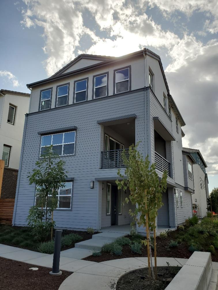 Pastoral Loop San Jose, CA 95122 - Photo 2 of 14 a front view of a house with plants