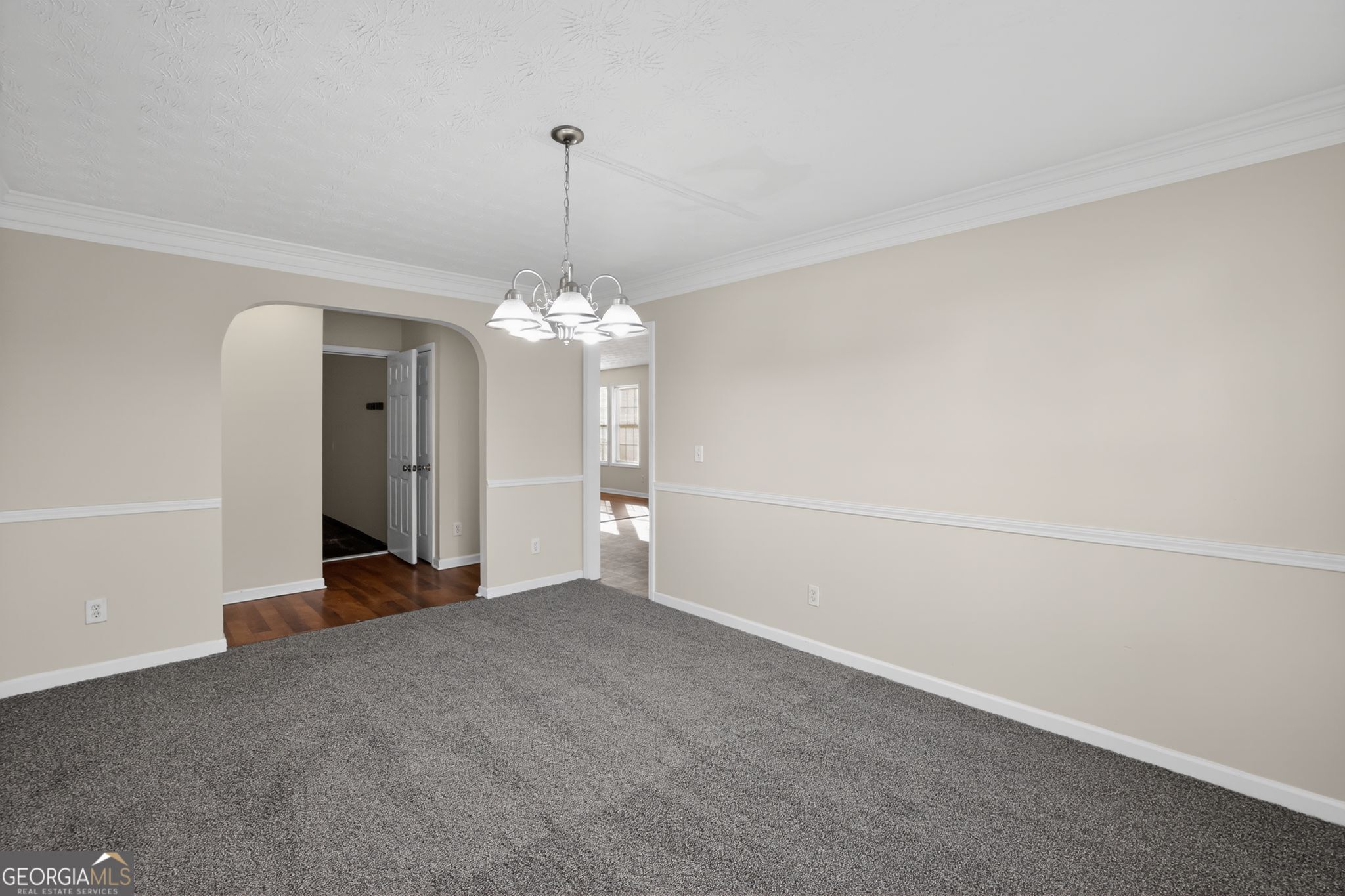 4375 Conley Landing Conley, GA 30288 - Photo 15 of 34 a view of a chandelier and window in a room