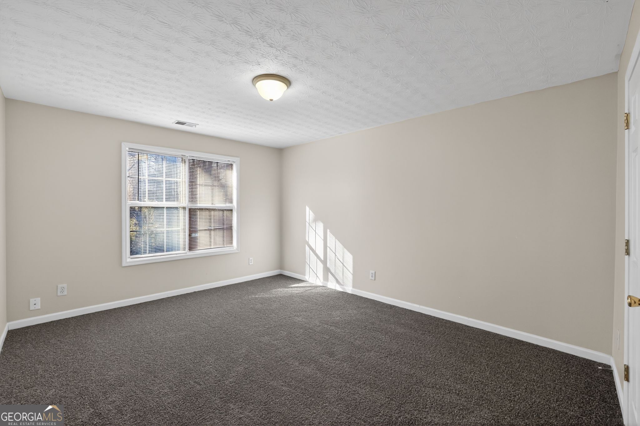 4375 Conley Landing Conley, GA 30288 - Photo 16 of 34 an empty room with a window