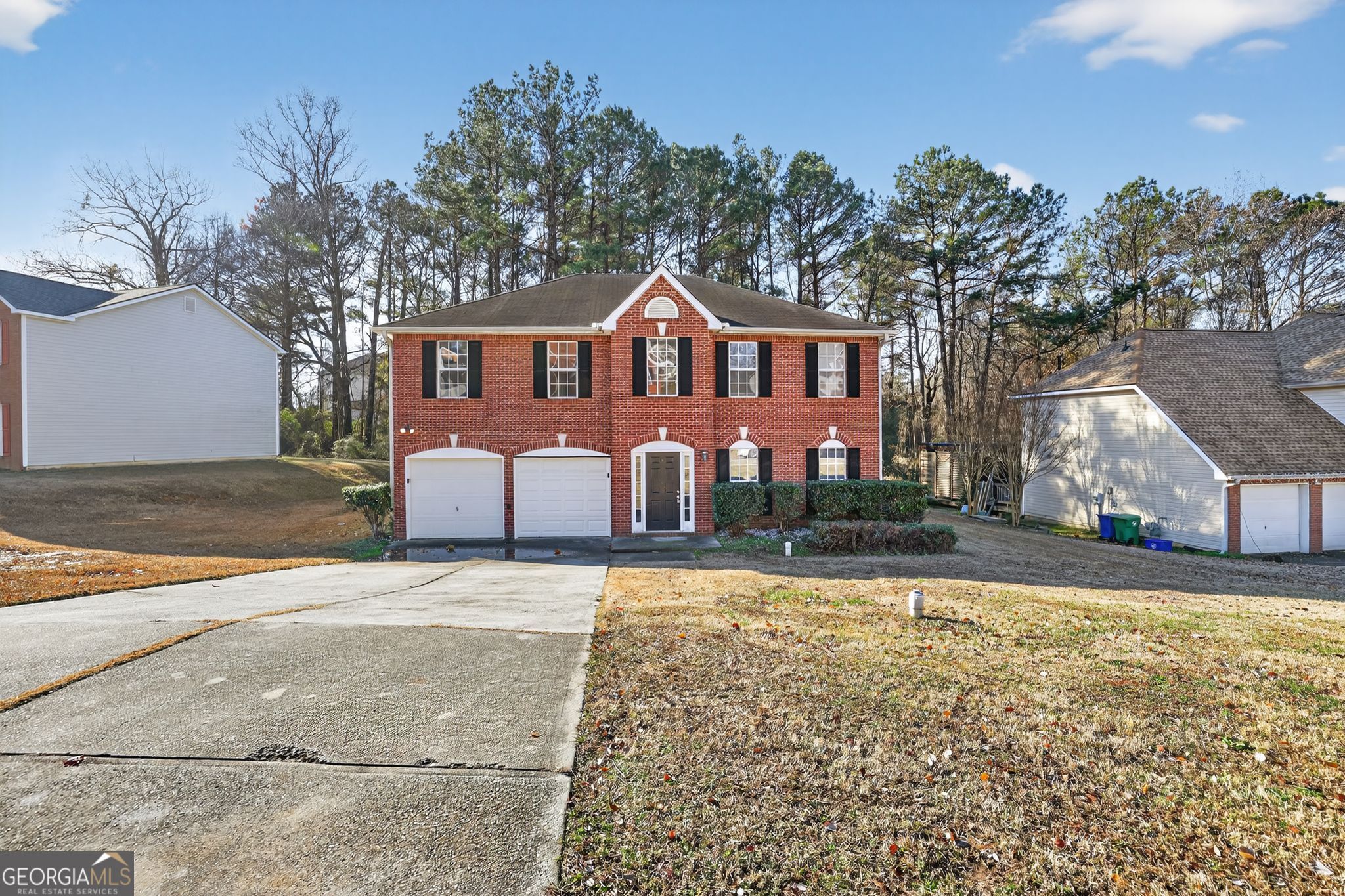 4375 Conley Landing Conley, GA 30288 - Photo 2 of 34 a front view of a house with a yard and trees