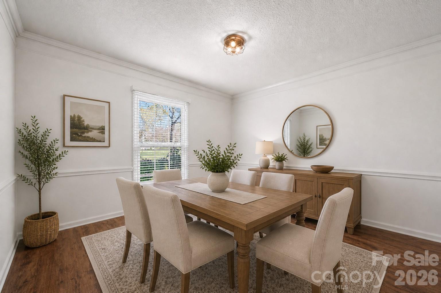 6101 Boykin Spaniel Road Charlotte, NC 28277 - Photo 12 of 40 a view of a dining room with furniture and wooden floor