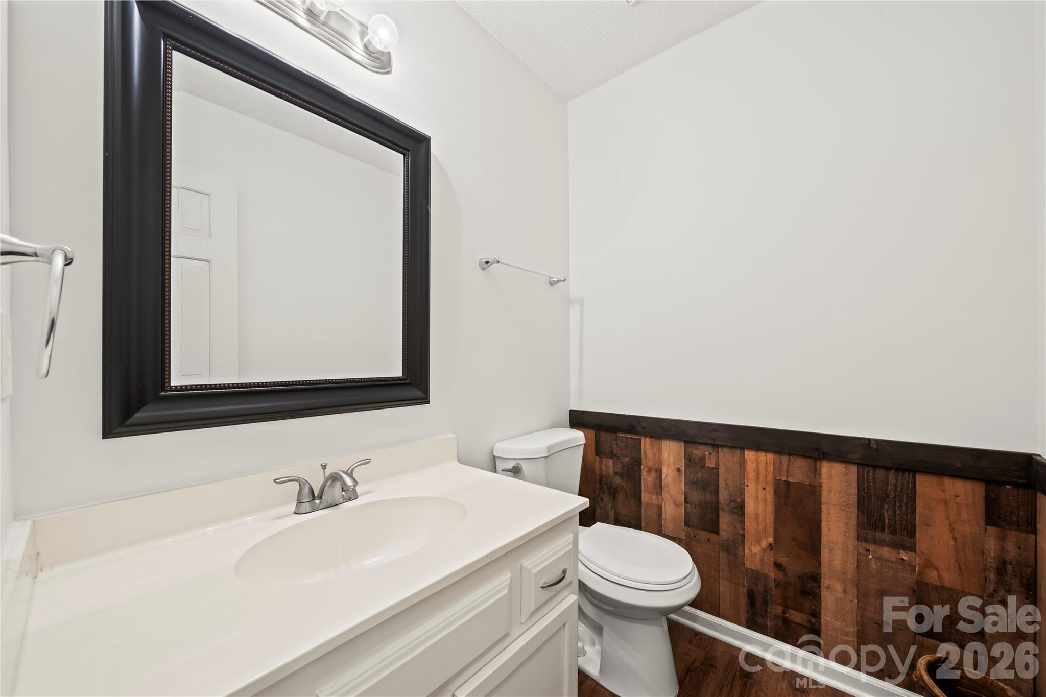 6101 Boykin Spaniel Road Charlotte, NC 28277 - Photo 22 of 40 a bathroom with a sink and a mirror