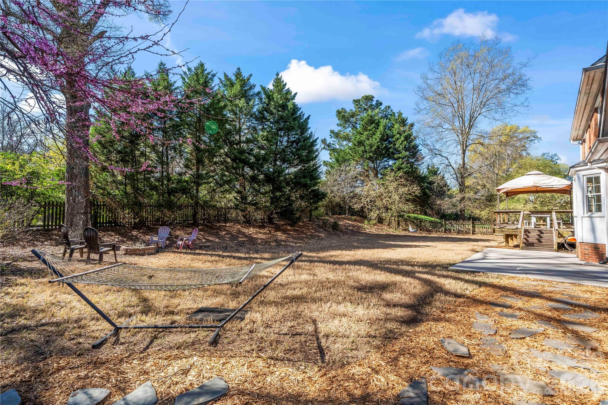 6101 Boykin Spaniel Road Charlotte, NC 28277 - Photo 36 of 40 a view of a swimming pool with a house in the background