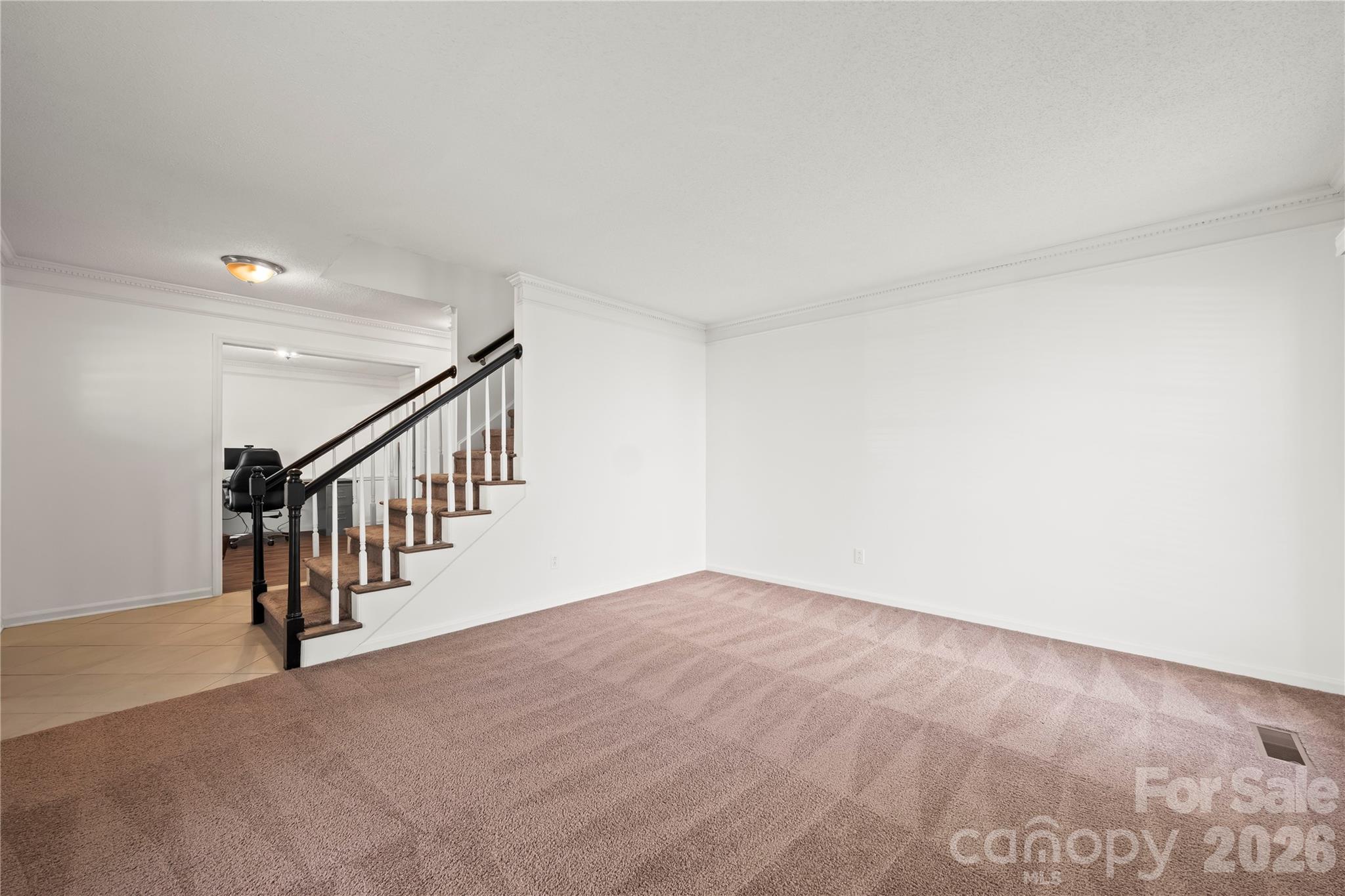 6101 Boykin Spaniel Road Charlotte, NC 28277 - Photo 9 of 40 a view of an empty room with stairs