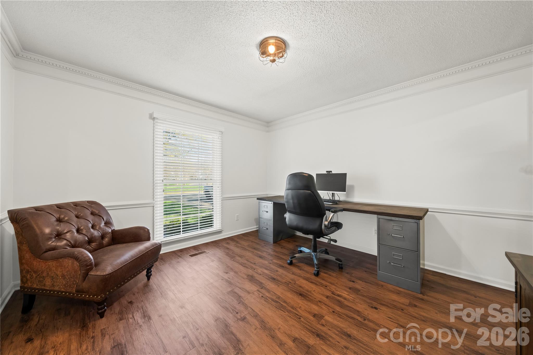 6101 Boykin Spaniel Road Charlotte, NC 28277 - Photo 10 of 40 a livingroom with workspace and a couch