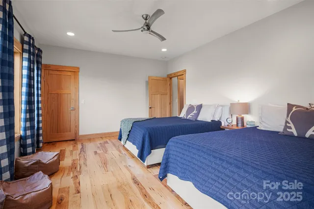 a bedroom with double bed and a closet