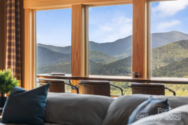 a living room with a couch and a window