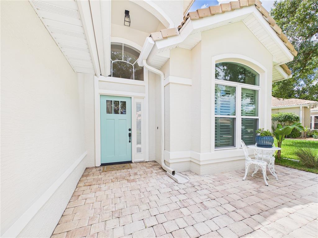 426 Long Cove Road Ormond Beach, FL 32174 - Photo 2 of 73 a front view of a house with entryway