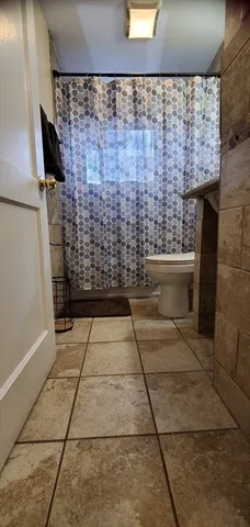 a bathroom with a sink and a shower