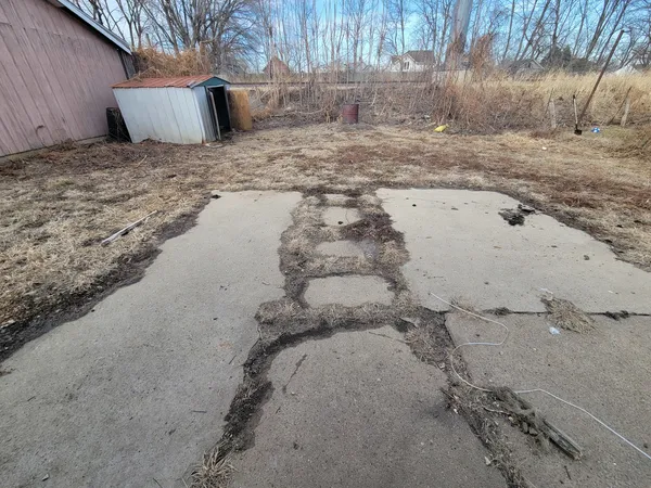 a view of a backyard of a house