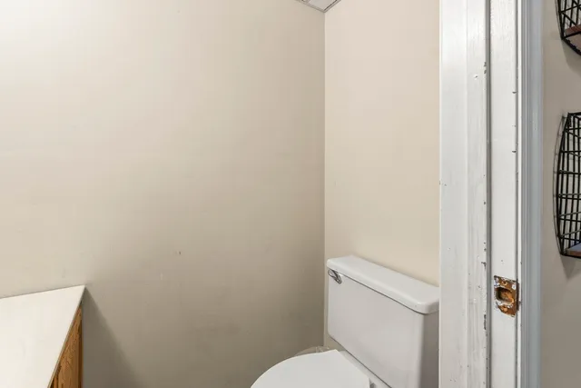 a view of a storage & utility room with chairs
