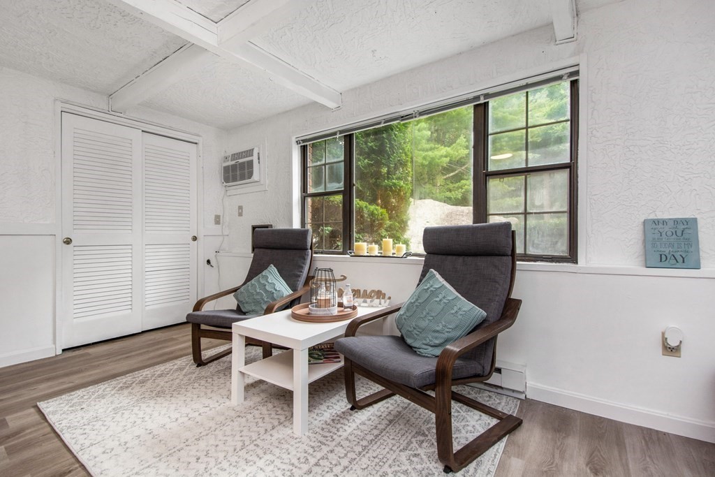 41 Spencer Road, Unit G16 Boxborough, MA 01719 - Photo 13 of 17 a living room with furniture and a window