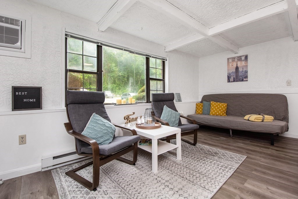 41 Spencer Road, Unit G16 Boxborough, MA 01719 - Photo 3 of 17 a living room with furniture and a window