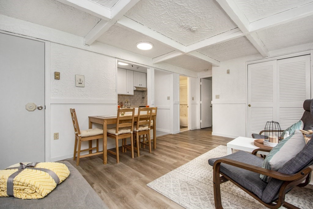 41 Spencer Road, Unit G16 Boxborough, MA 01719 - Photo 6 of 17 a workspace with furniture and wooden floor