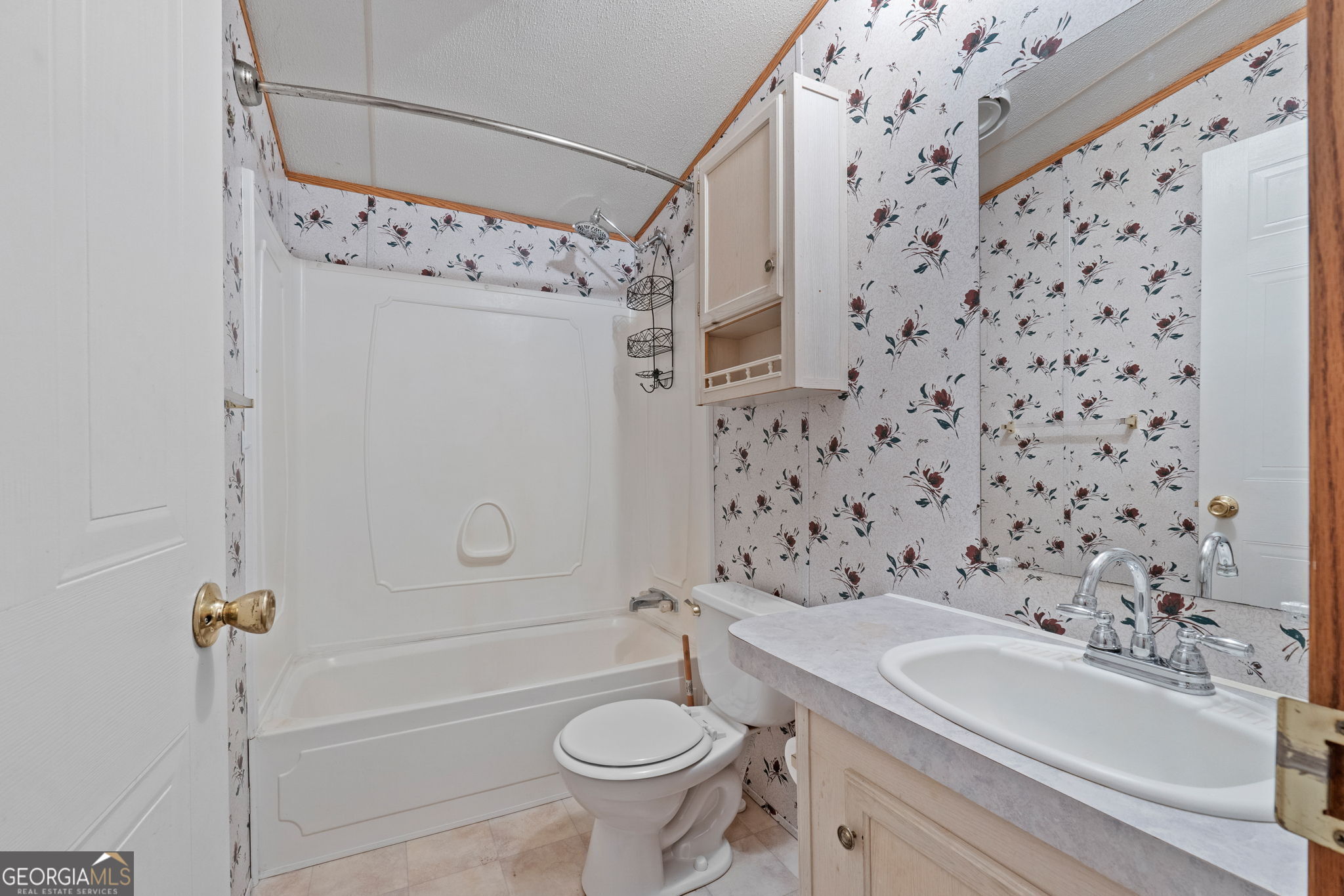 868 South Steel Bridge Road Eatonton, GA 31024 - Photo 51 of 64 a bathroom with a sink toilet and shower