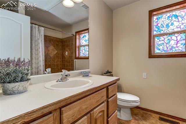 9737 Rockingham Drive Peyton, CO 80831 - Photo 15 of 28 ~Full bath on the main level~
