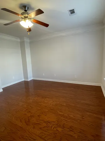 a view of room with ceiling fan
