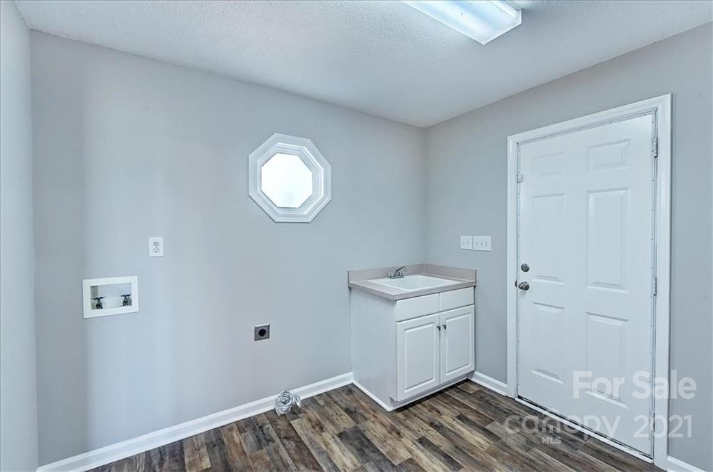 4103 Watson Church Road Monroe, NC 28110 - Photo 18 of 28 a view of a room with wooden floor