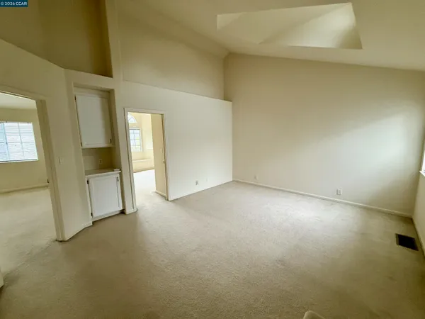 an empty room with a bathroom