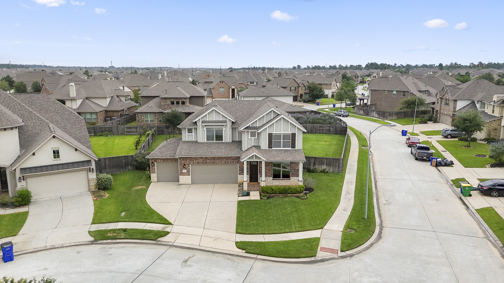 7502 Windsor Park Court Spring, TX 77379 - Photo 44 of 50 an aerial view of a house with a garden and lake view